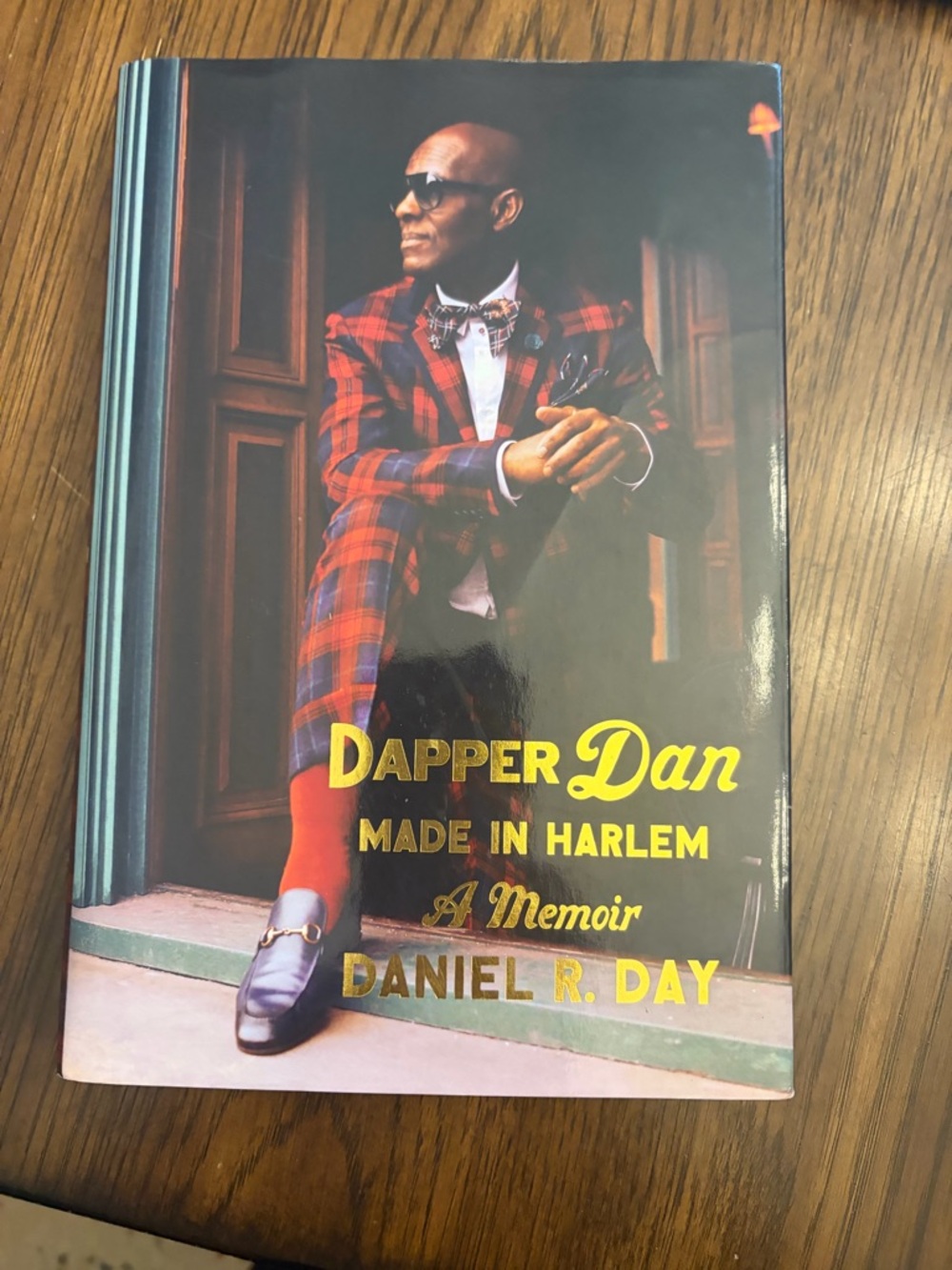 Dapper Dan Made in Harlem by Daniel R. Day. Hardcover book. Men’s fashion icon.